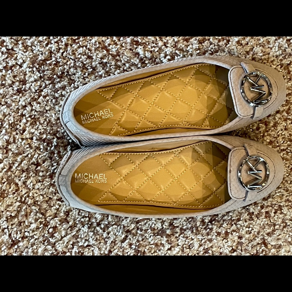 Like new Michael Kors flats. Worn once.